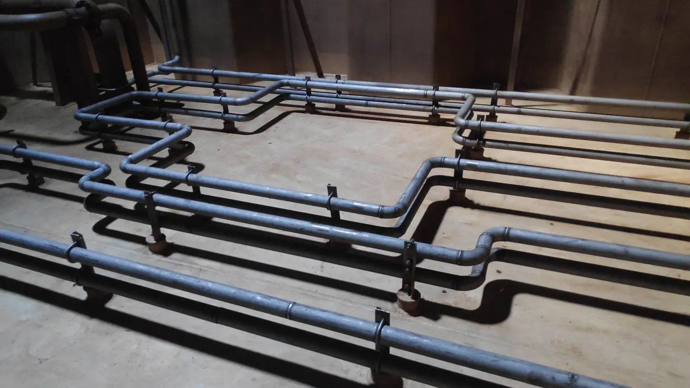 Ballast and bilge piping inspected inside a cargo hold